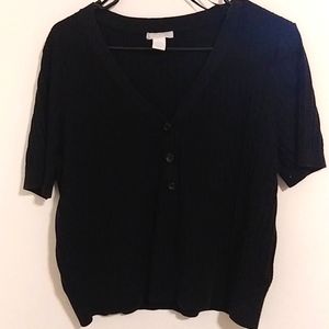 Black shirt with buttons and low v-neck